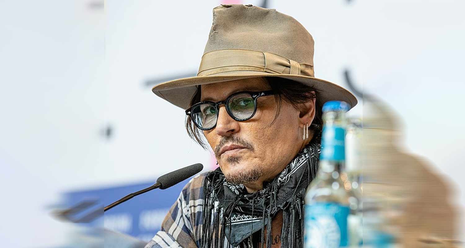 ecco perche Johnny Depp non guarda Amber Heard